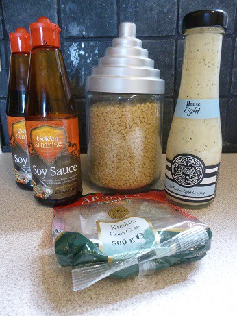 Picture of some less successful frugal purchases I've made from Approved Food, the discount food website, including Golden sunrise soy sauce,giant cous couse and Pizza Express light salad dressing.