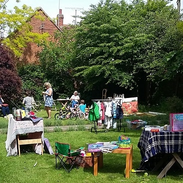 Picture of our front garden filled with stalls and people for the Hadleigh Yard Sale