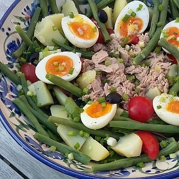 Picture of tuna nicoise salad using Havensfield eggs and Fairfields Farm potatoes, part of the Sourced Locally range from East of England Co-op
