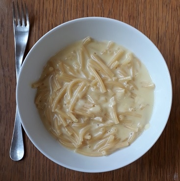 Picture of Batchelor's Pasta N Sauce Macaroni cheese in a bowl, after cooking, with a fork