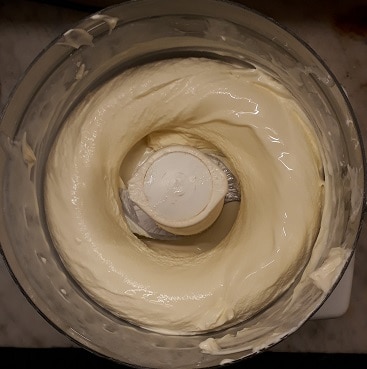 Picture of cream after it's been whipped in a food processor, when I made butter